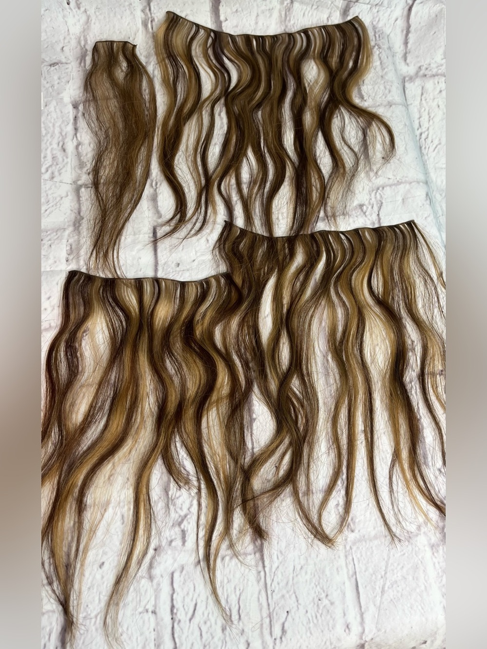 Human hair tie in extensions 16in Carmel and medium brown highlights